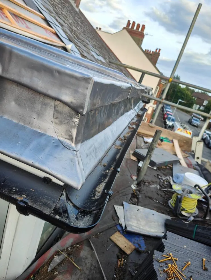 Dormer cheek clad in new lead