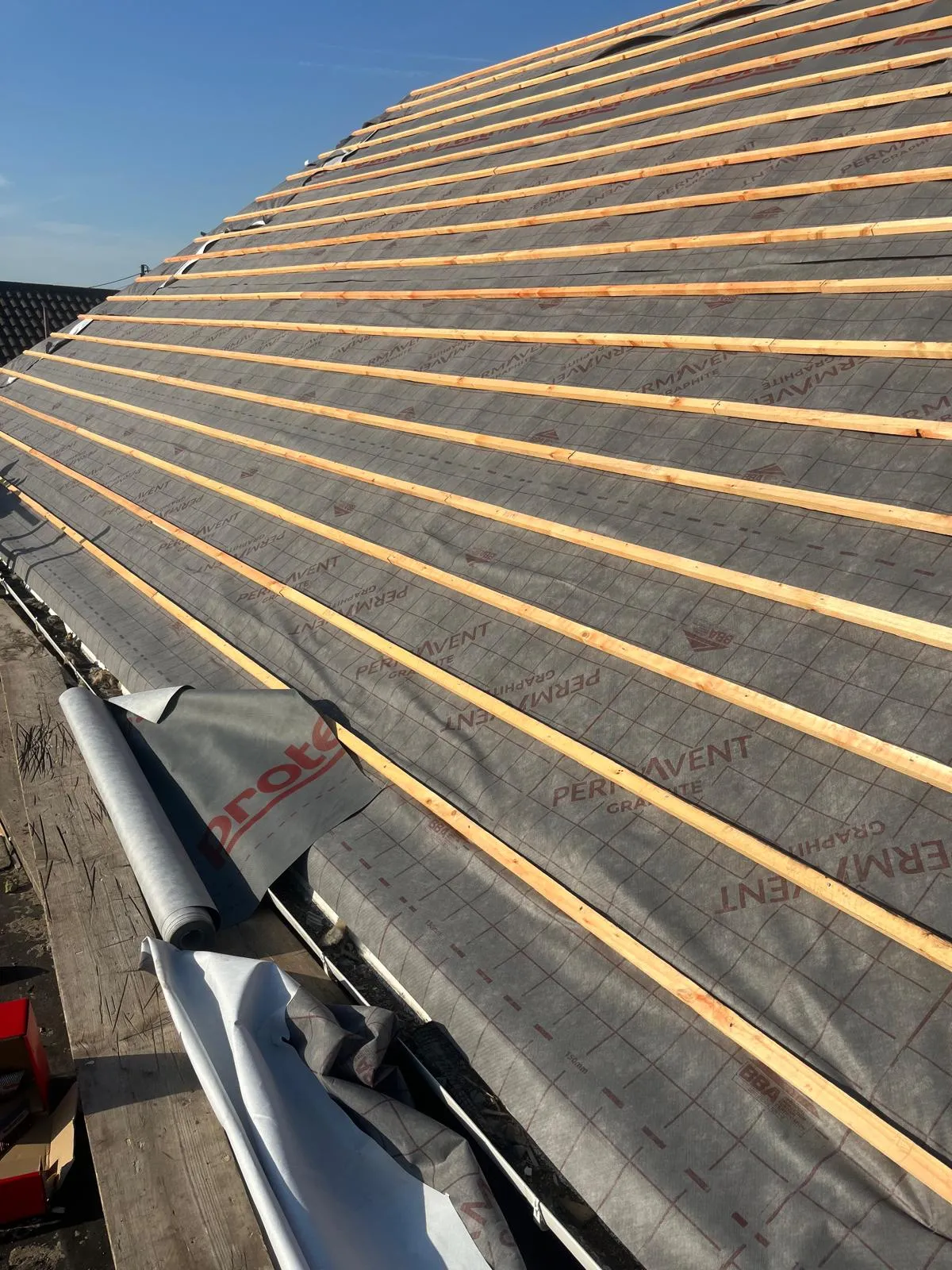 Breathable membrane and new battens fixed across the roof